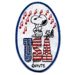 : Snoopy wearing baseball catcher glove mitt with Woodstock patriotic 