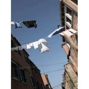 Apartment Buildings with Laundry Hanging Out to Dry on Clothes Line 