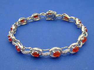  Tennis bracelet features Genuine Mexican Fire Opals, accentuated 