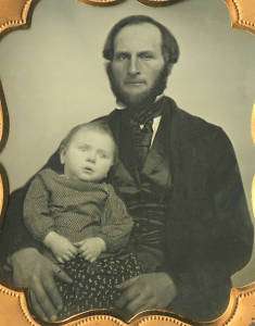 PLATE DAGUERREOTYPE OF A BEARDED MAN HOLDING BABY POST MORTEM 