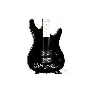  Willie Nelson And Toby Keith Signed Black Electric Guitar 
