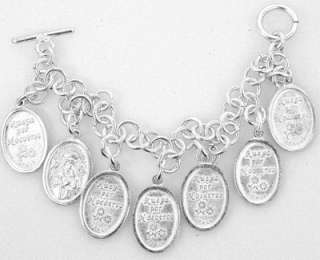 This is a very special saints charm bracelet. It is silver plated and 