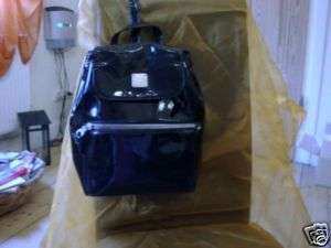   MCM*   BACKPACK in black patent leather       best condition