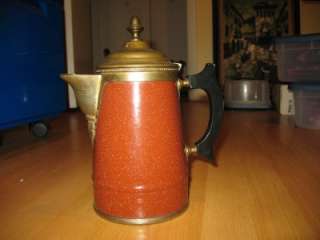 rare color speckled orange rust the pot stands 10 inches tall this has 