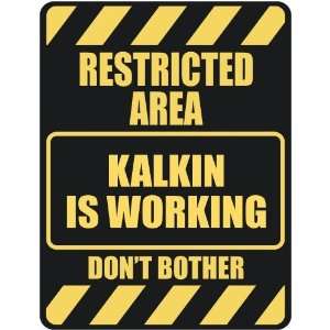   RESTRICTED AREA KALKIN IS WORKING  PARKING SIGN
