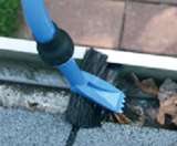Use the Gutter Brush with Water Jet Nozzle to rinse the gutter clean 