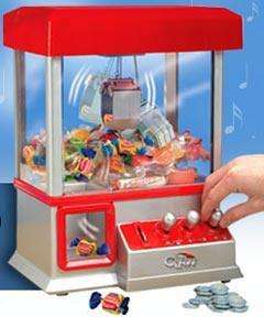   Gallery for The Claw Electronic Candy Grabber Machine Arcade Game