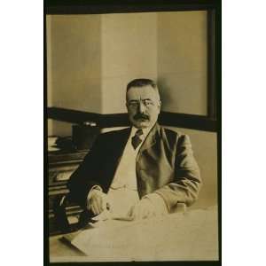 Photo George B. Cortelyou, half length portrait, seated at 