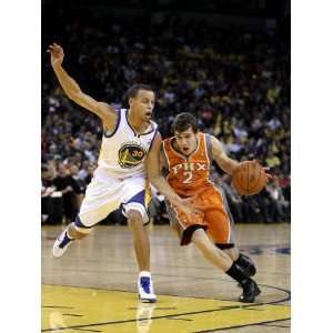 Phoenix Suns v Golden State Warriors Goran Dragic and Stephen Curry 