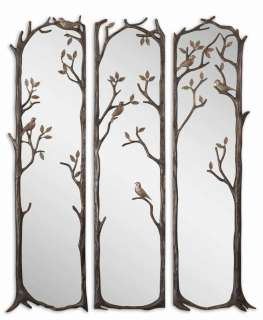 Statuesque, decorative set of mirrors features a heavily antiqued 